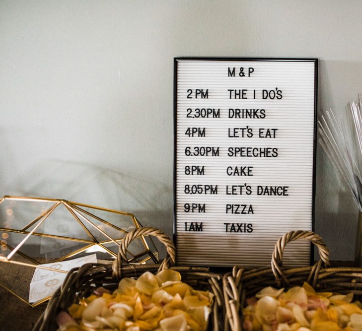 Black and White Order of the Day Peg Board Wedding Sign