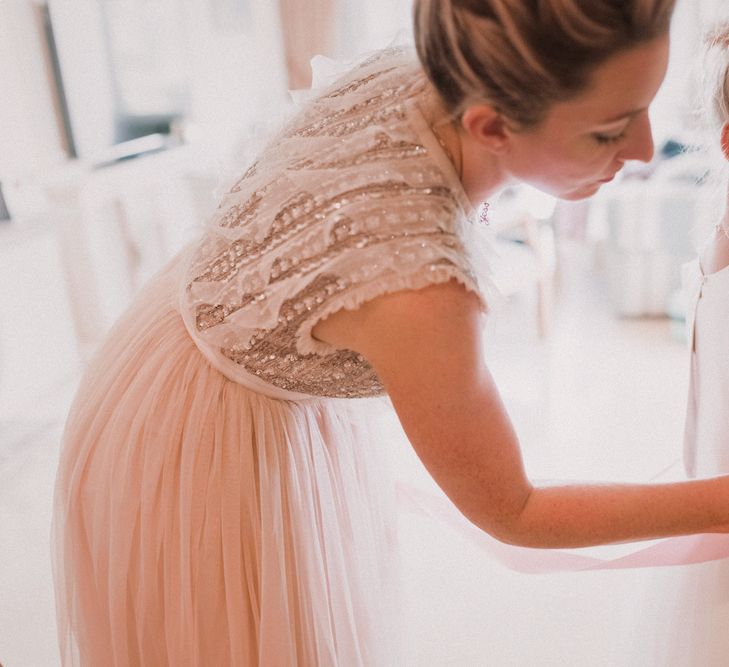 Flower Girl and Bridesmaid Getting Ready | Blush Pink &amp; White Marbella Beach Wedding at El Chiringuito, Puente Romano |  Kino Ortega Photographer