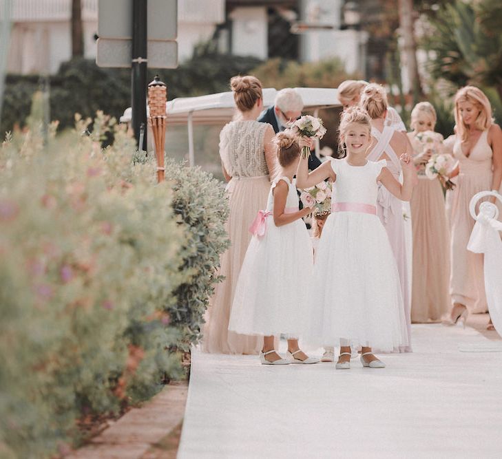 Bridal Party Entrance | Blush Pink &amp; White Marbella Beach Wedding at El Chiringuito, Puente Romano |  Kino Ortega Photographer