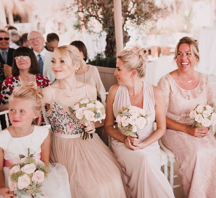 Wedding Ceremony | Bridesmaids in Different Blush Dresses | Blush Pink &amp; White Marbella Beach Wedding at El Chiringuito, Puente Romano |  Kino Ortega Photographer