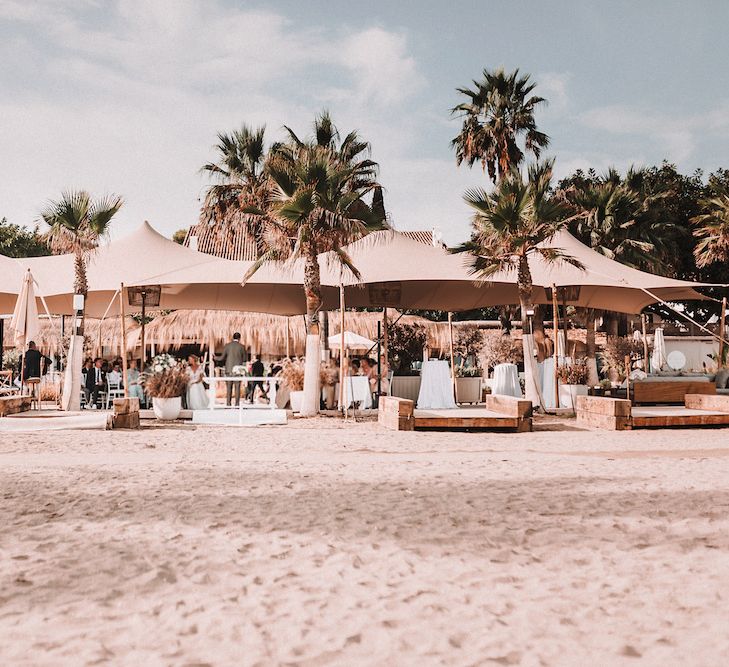 Wedding Ceremony | Bride in Yaki Ravid Gown | Groom in Armani Suit | Blush Pink &amp; White Marbella Beach Wedding at El Chiringuito, Puente Romano |  Kino Ortega Photographer