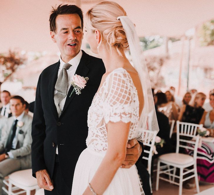 Wedding Ceremony | Bride in Yaki Ravid Gown | Groom in Armani Suit | Blush Pink &amp; White Marbella Beach Wedding at El Chiringuito, Puente Romano |  Kino Ortega Photographer