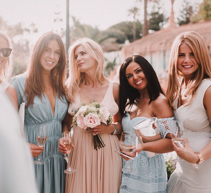 Wedding Guests | Blush Pink &amp; White Marbella Beach Wedding at El Chiringuito, Puente Romano |  Kino Ortega Photographer