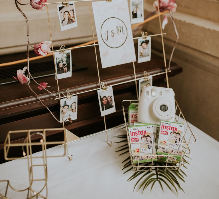 Guest Book Table For Wedding With Polaroid Camera / Image By Nataly J Photography