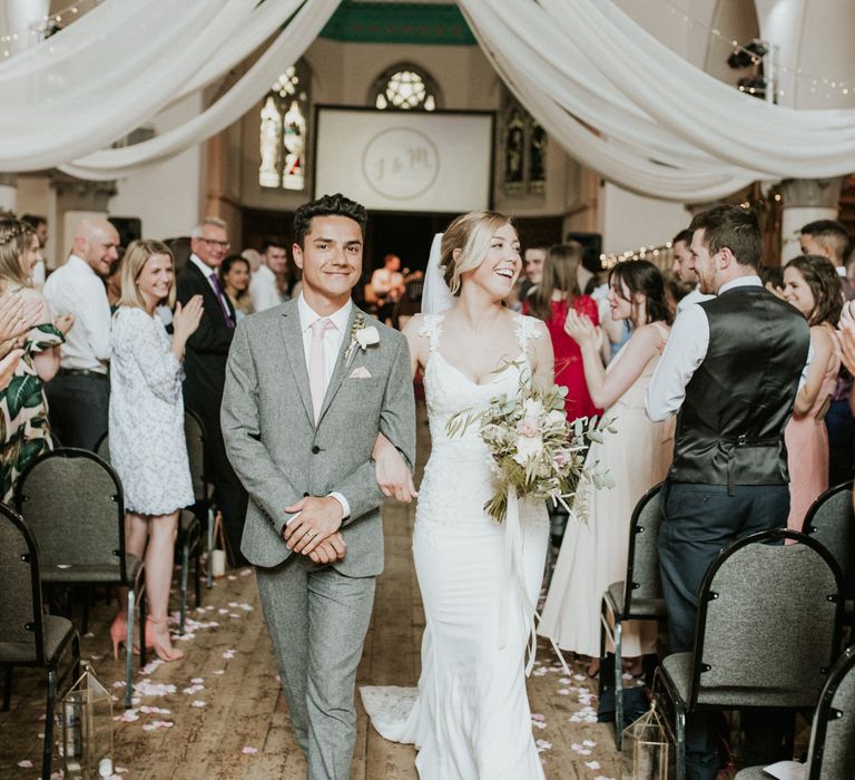 Wedding Ceremony With White Drapes For Decor / Image By Nataly J Photography