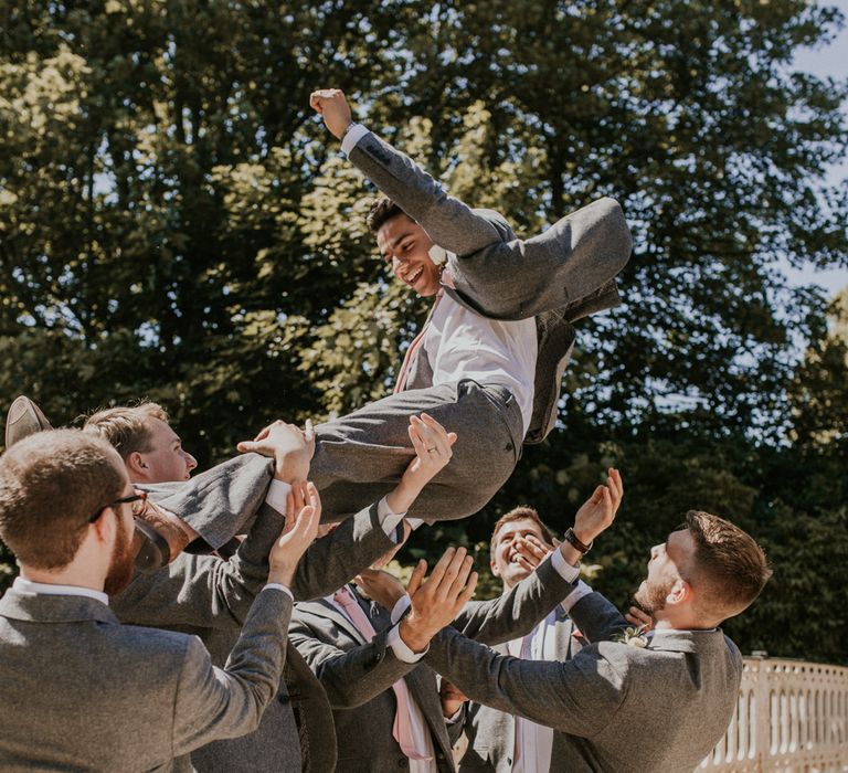 Groom &amp; Groomsmen In Grey Suits From Next With Pale Pink Ties / Image By Nataly J Photography