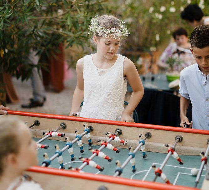 Table football at an outdoor wedding