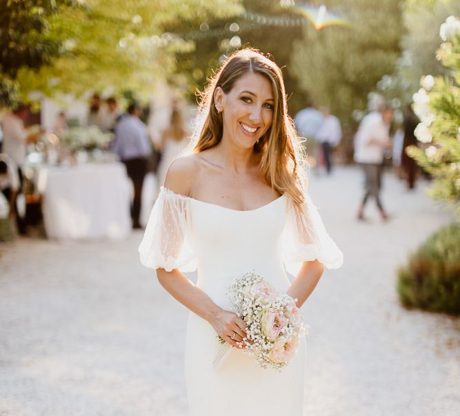 Bride in off the shoulder dress made by the bride and her team at Halfpenny London