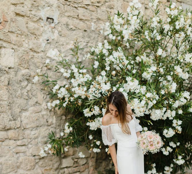 Bride in off the shoulder dress made by the bride and her team at Halfpenny London