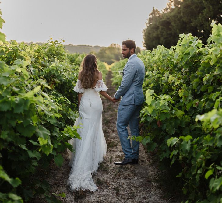 Bride and groom in Provence vineyard