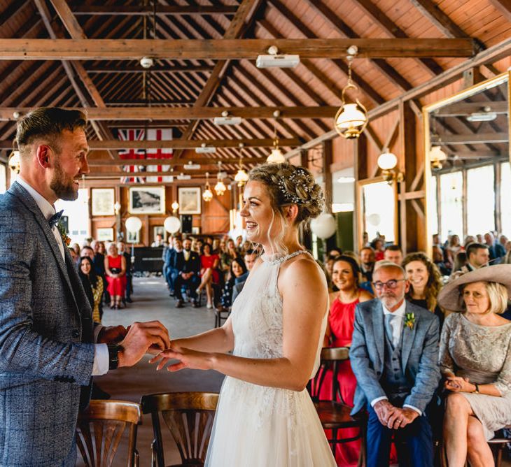 Wedding Ceremony | Bride in Halterneck Tulle Allure Bridal Wedding Dress | Groom in  Blue Check Moss Bros. Suit | Vintage Fairground at Blists Hill Victorian Town Museum in Ironbridge | Lisa Carpenter Photographer