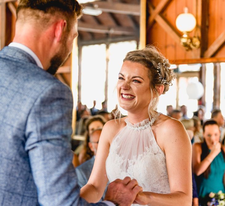 Wedding Ceremony | Bride in Halterneck Tulle Allure Bridal Wedding Dress | Groom in  Blue Check Moss Bros. Suit | Vintage Fairground at Blists Hill Victorian Town Museum in Ironbridge | Lisa Carpenter Photographer