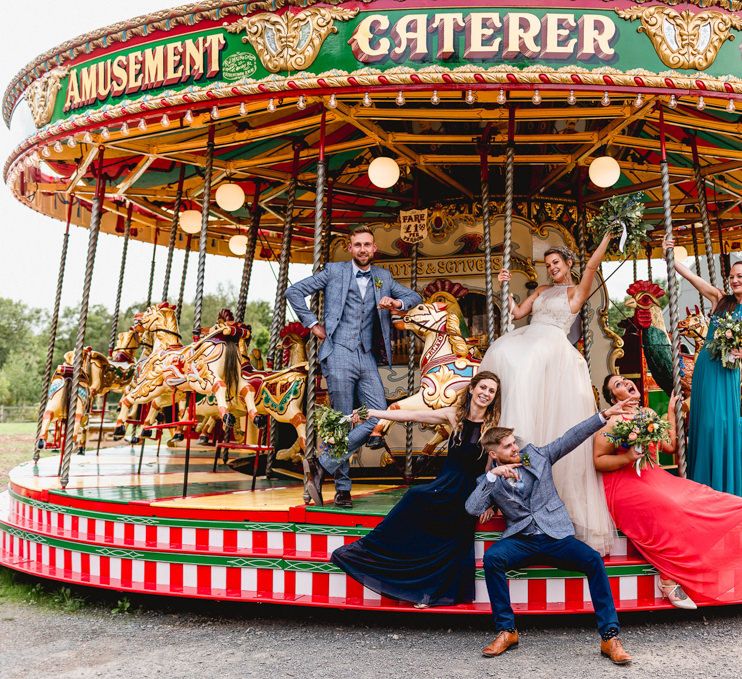 Wedding Party | Bridesmaids in Different Coloured Dresses | Bride in Halterneck Tulle Allure Bridal Wedding Dress | Groom in  Blue Check Moss Bros. Suit | Vintage Fairground at Blists Hill Victorian Town Museum in Ironbridge | Lisa Carpenter Photographer