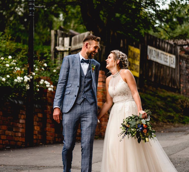 Bride in Halterneck Tulle Allure Bridal Wedding Dress | Groom in  Blue Check Moss Bros. Suit | Vintage Fairground at Blists Hill Victorian Town Museum in Ironbridge | Lisa Carpenter Photographer