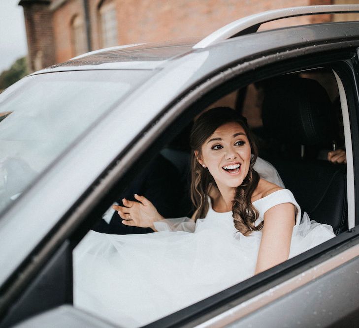 Bride arriving in the Wedding Car