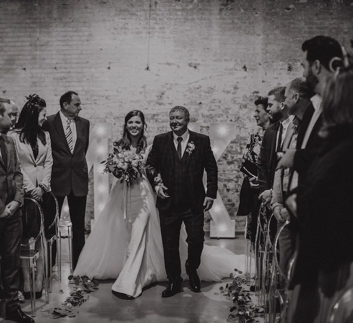 Bride Walking Down the Aisle with her Father