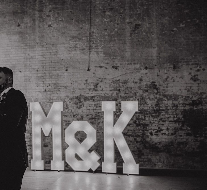 Bride and Groom First Dance in Front of Giant Light Up Letters