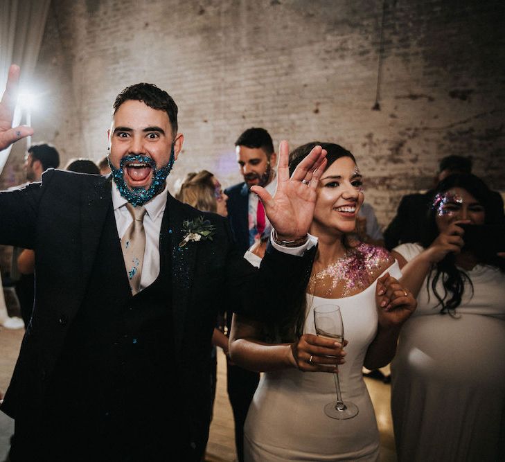 Bride &amp; Groom Enjoying the Evening Reception with Blue Glitter Beard &amp;  Shoulder  Decor