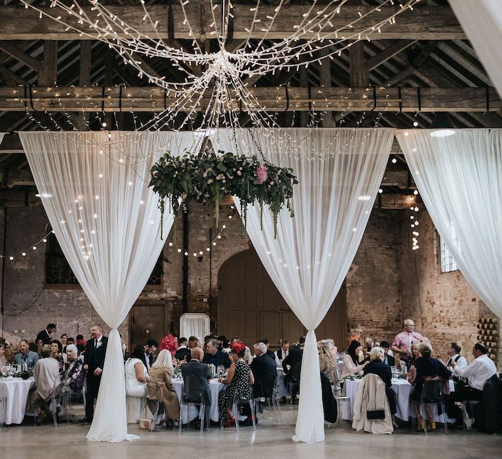 Fairy Light Canopy and Floral Chandelier Wedding Reception Decor