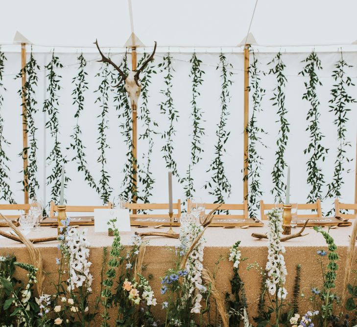 Hanging Foliage Display For Marquee Wedding // Woodland Luxe Wedding With Personalised Wooden Place Mats For Guests Marquee Wedding At Home With Images From Darina Stoda Photography