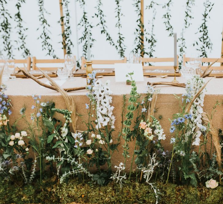 Hanging Foliage Display For Marquee Wedding // Woodland Luxe Wedding With Personalised Wooden Place Mats For Guests Marquee Wedding At Home With Images From Darina Stoda Photography