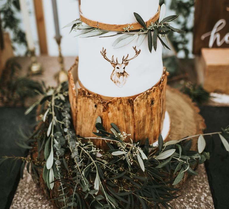 Iced Wedding Cake With Stag Motif // Woodland Luxe Wedding With Personalised Wooden Place Mats For Guests Marquee Wedding At Home With Images From Darina Stoda Photography