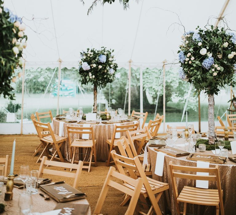 Hanging Foliage Display For Marquee Wedding // Woodland Luxe Wedding With Personalised Wooden Place Mats For Guests Marquee Wedding At Home With Images From Darina Stoda Photography