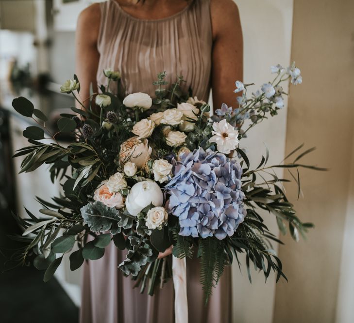 Bridesmaids Bouquet With Blue Hydrangea // Church Wedding In Norfolk // Woodland Luxe Wedding With Personalised Wooden Place Mats For Guests Marquee Wedding At Home With Images From Darina Stoda Photography