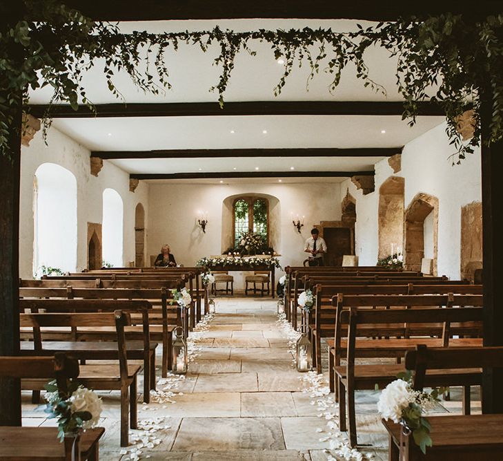 Wedding Ceremony Room with Petal Covered Aisle