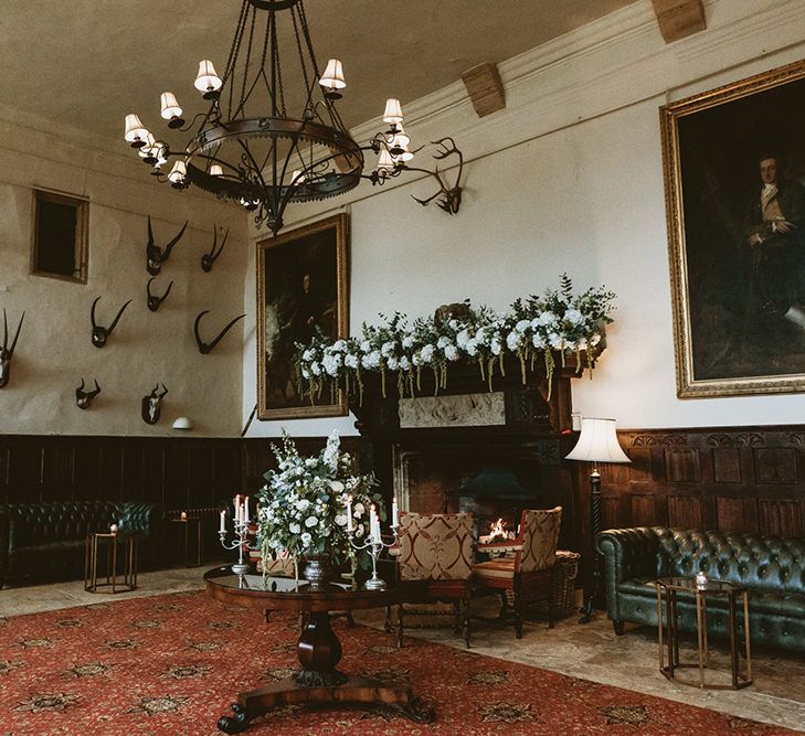 Giant Fire Place with White and Green Wedding Flowers