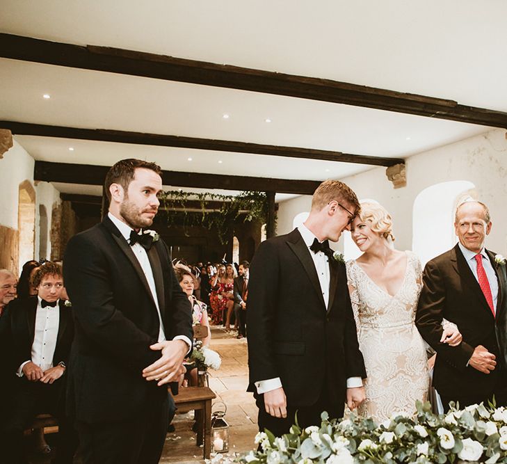 Wedding Ceremony with Bride in Vintage Style Tara Lauren Wedding Dress  and Groom in Black Tie