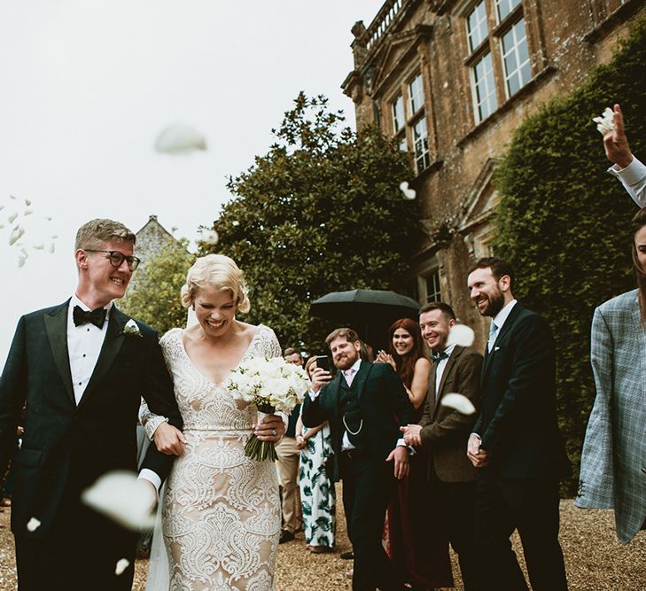 Confetti Exit with Bride in Vintage Style Tara Lauren Wedding Dress  and Groom in Black Tie