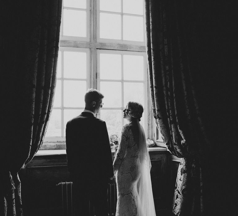 Bride in Vintage Style Tara Lauren Wedding Dress  and Groom in Black Tie