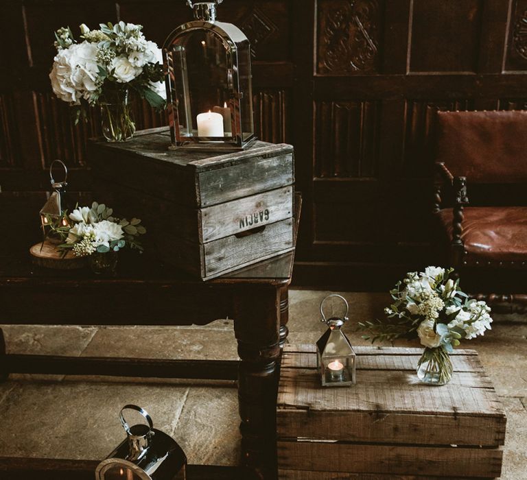 Wooden Crates with Hurricane Lanterns and Wedding Flowers