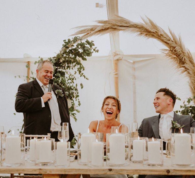 Pampas grass moon gate back drop for wedding speeches