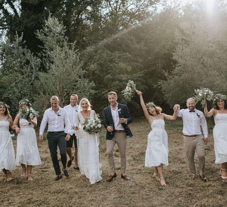 Wedding Party | Bride in Spell &amp; the Gypsy Collective Bell Sleeve Wedding Dress | Bridesmaids in White Dresses | Groom in Chino's &amp; Blazer | Outdoor Bohemian Destination Wedding at La Selva, Tuscany | Damien Milan Photography