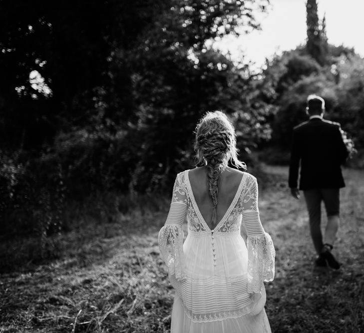 Bride in Spell &amp; the Gypsy Collective Bell Sleeve Wedding Dress | Groom in Chino's &amp; Blazer | Outdoor Bohemian Destination Wedding at La Selva, Tuscany | Damien Milan Photography