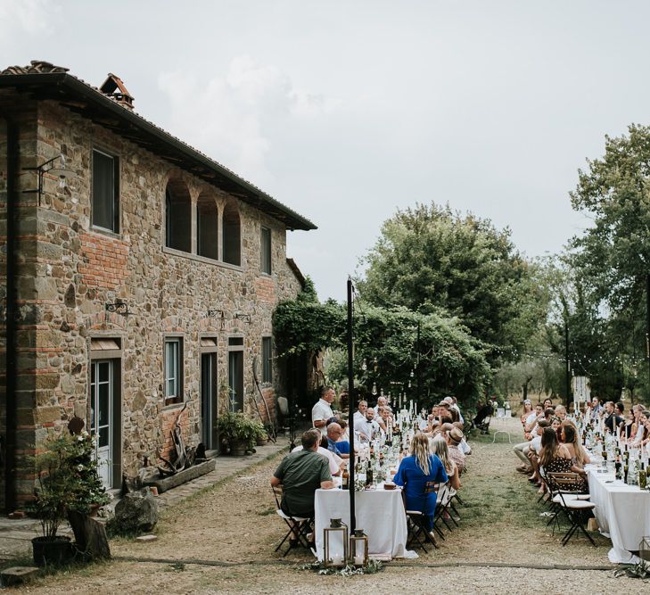 Festoon Lit Outdoor Reception | Bohemian Destination Wedding at La Selva, Tuscany | Damien Milan Photography