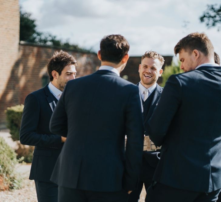 Groom and groomsmen getting ready for civil ceremony at Hornington Manor