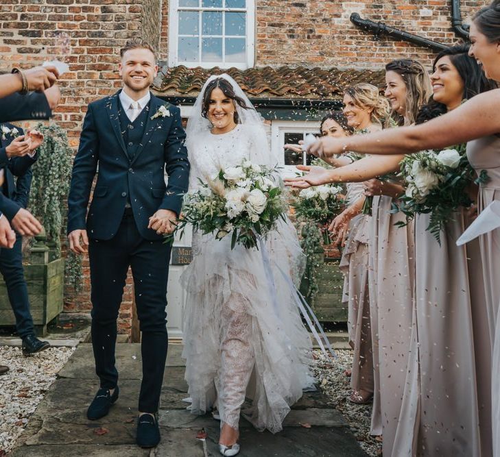 Confetti exit for bride and groom