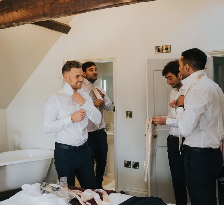 Groom and groomsmen getting ready for civil ceremony at Hornington Manor