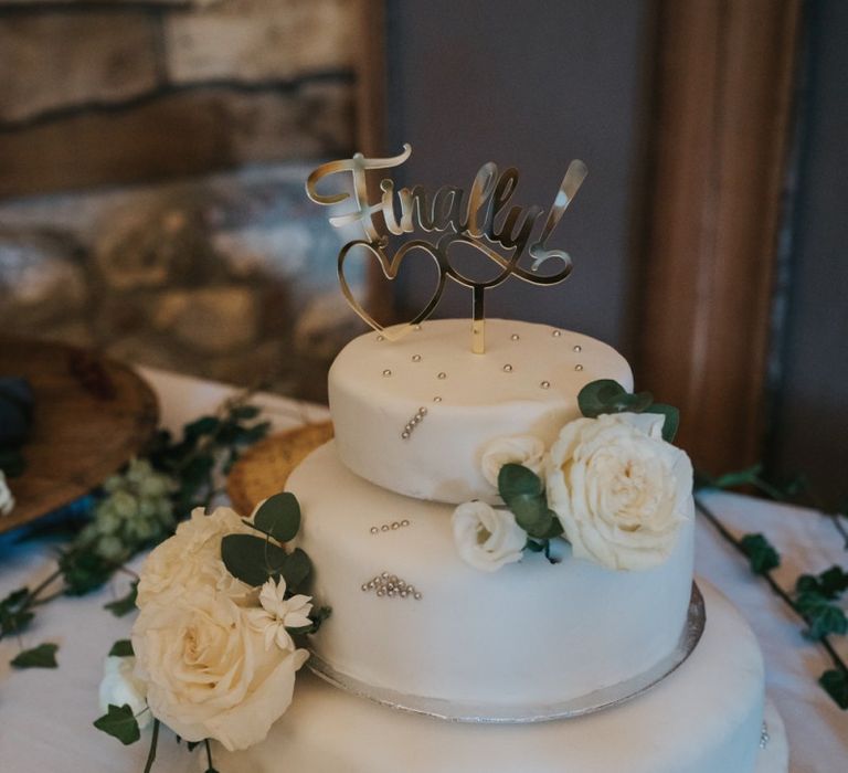 Traditional wedding cake with flower decor