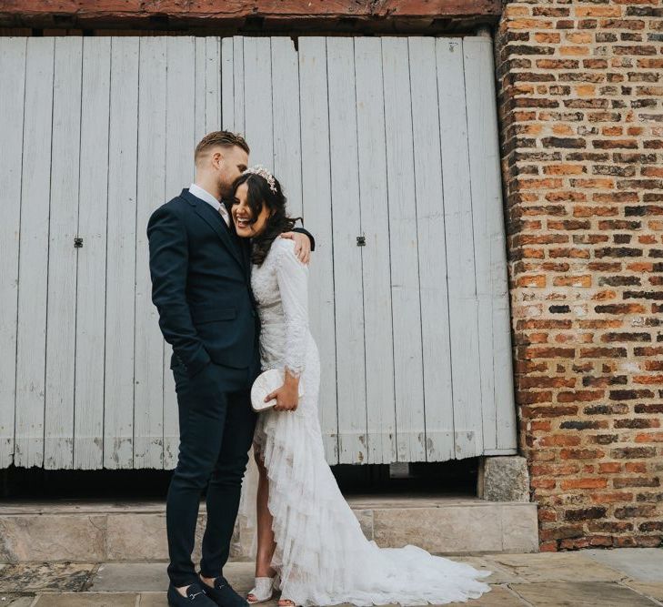 Bride wears bespoke Emma Beaumont wedding dress