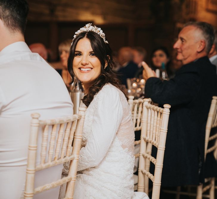 Bride wears bridal crown for wedding reception