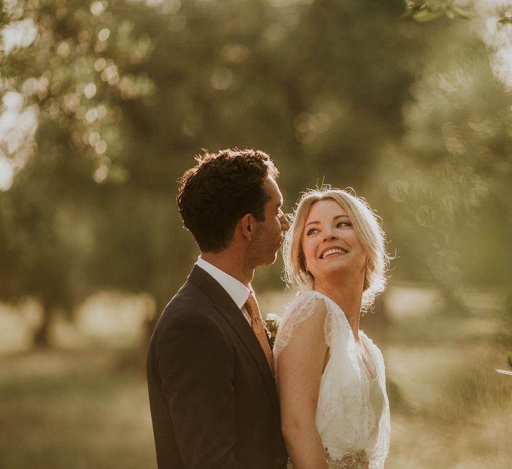 Golden Hour Portrait with Bride in Halfpenny Wedding Dress and Groom in Navy Suit