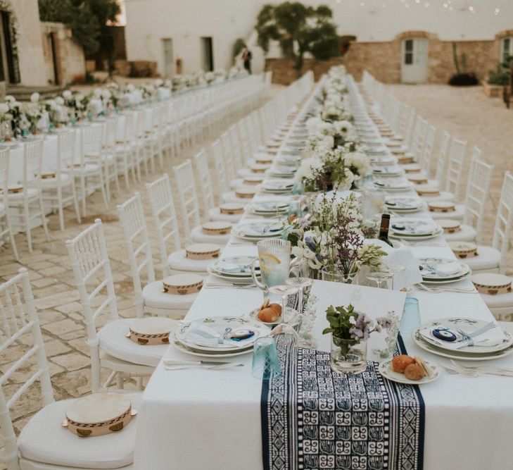 Blue and White Wedding Table Runner and Floral Centrepieces