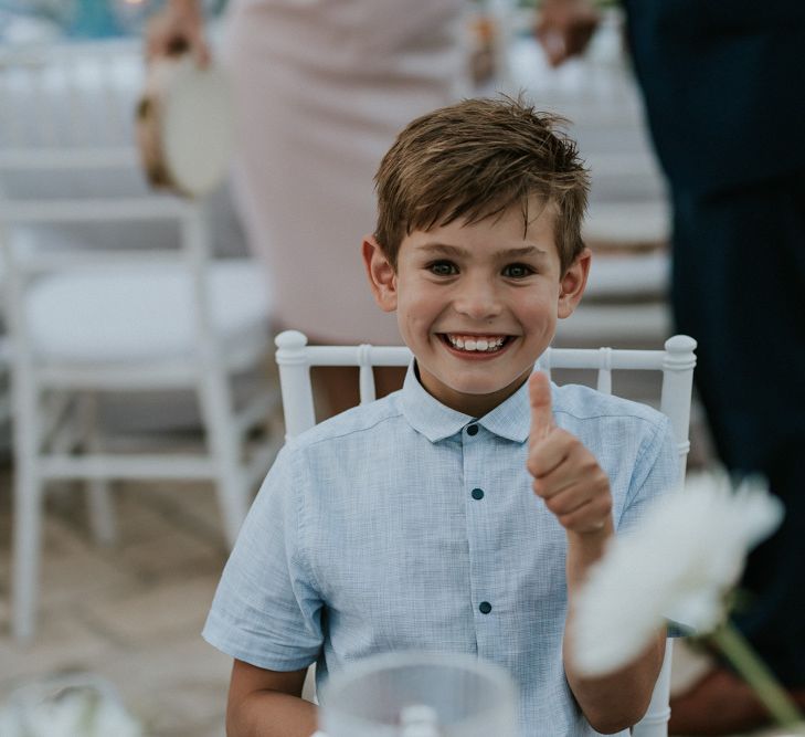 Young Boy Wedding Guests Giving Thumbs Up