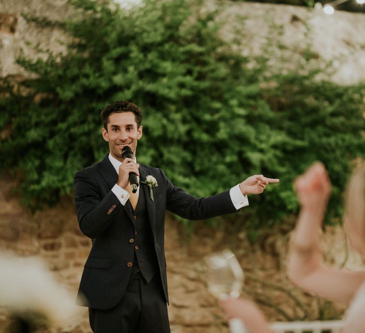 Groom in Three-Piece Wedding Suit Giving His Wedding Speech