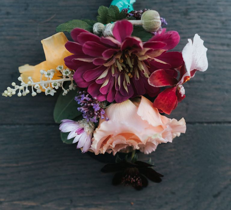 Colourful Buttonhole of Red and Pink Flowers | Meringue Kisses &amp; Colourful Wedding Flowers &amp; Stationery for a London Wedding at The Globe | Miss Gen