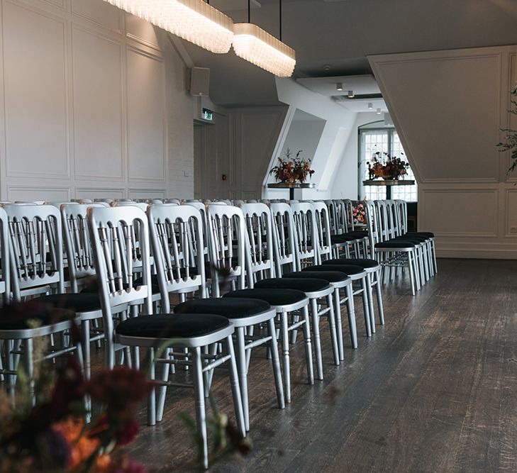 Wedding Ceremony at The Swan at The Globe | Giant Urns of Red Flowers and Foliage on Grey Plinths | Meringue Kisses &amp; Colourful Wedding Flowers &amp; Stationery for a London Wedding at The Globe | Miss Gen